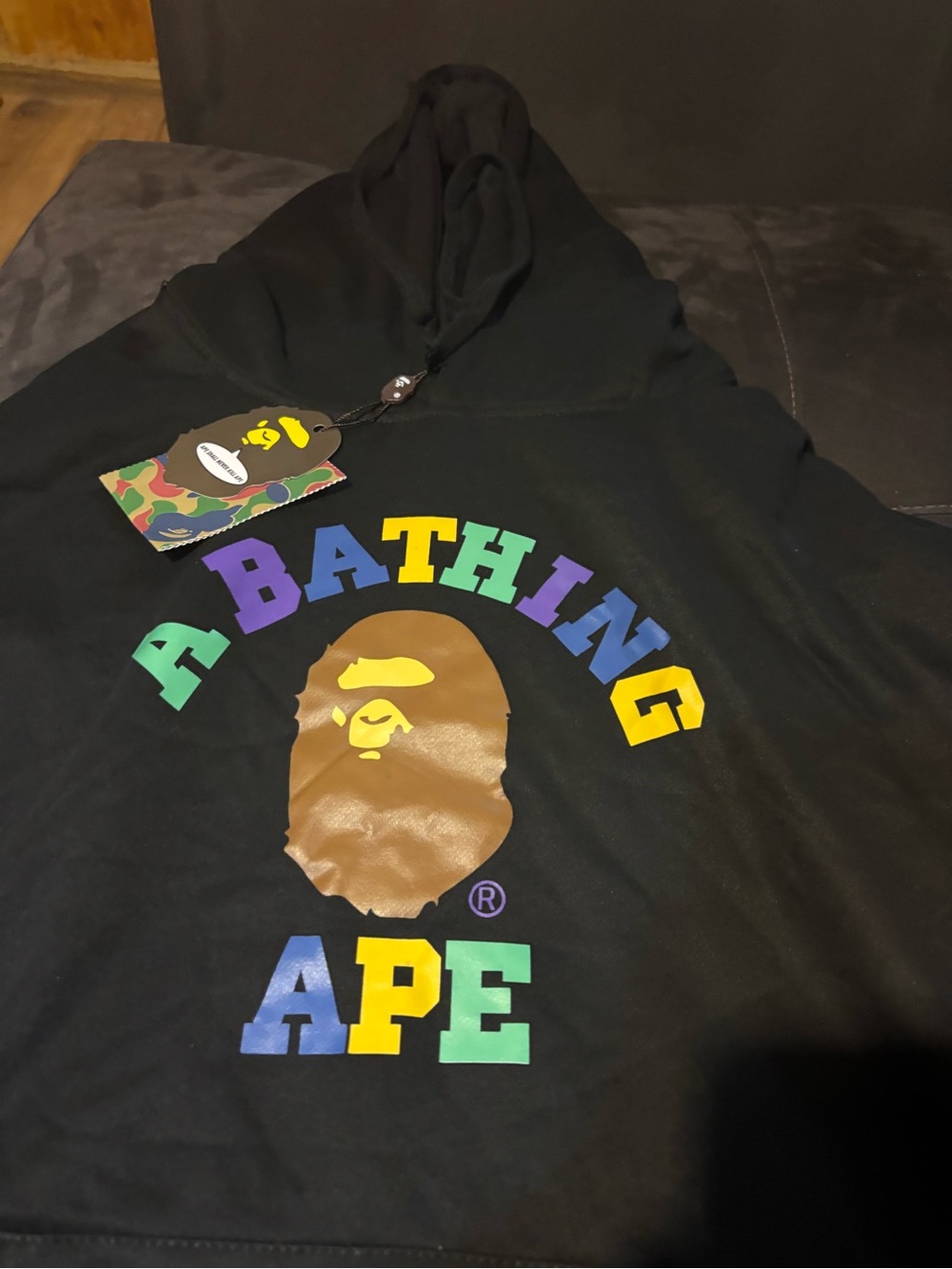A Bathing Ape Black Graphic Hoodie with Multicolor Logo